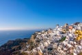 White Houses and Windmills on a Mountainside in Santorini Royalty Free Stock Photo