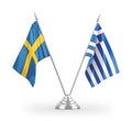 Greece and Sweden table flags isolated on white 3D rendering