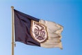 Greece, Thessaloniki, Flag on blue sky background of PAOK Salonika at football stadium