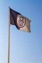 Greece, Thessaloniki, Flag on blue sky background of PAOK Salonika at football stadium