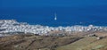 Greece Tinos island Cyclades. Aerial drone panoramic view of Hora, white building, port, blue sea Royalty Free Stock Photo