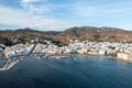 Greece, Tinos island Hora town Cyclades. Aerial drone panoramic view of harbor, Aegean sea blue sky Royalty Free Stock Photo