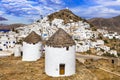 Greece travel, Cyclades. Ios island and old windmills Royalty Free Stock Photo