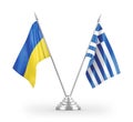 Greece and Ukraine table flags isolated on white 3D rendering