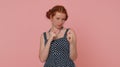 Greedy avaricious redhead young woman showing fig negative gesture, rapacious avaricious acquisitive Royalty Free Stock Photo