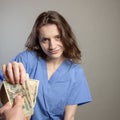 Greedy Doctor taking cash Royalty Free Stock Photo