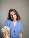 Greedy Doctor taking cash Royalty Free Stock Photo