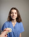 Greedy Doctor taking cash Royalty Free Stock Photo