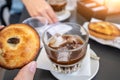 A greedy specialty of Salento, Puglia, Italy. Coffee with ice and almond syrup accompanied by another local specialty: Royalty Free Stock Photo