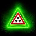 Greeen Neon Radiation Risk Sign on Grunge Background