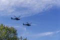 Greek Air Force Apache helicopters flying.