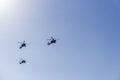 Greek Air Force Apache helicopters flying.