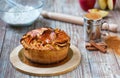 Greek apple pie with baking utensils