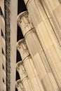 Greek architectural style fluted stone building columns in sunlight