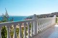 Greek balcony with balusters, sea view near Athens Royalty Free Stock Photo