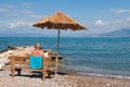Greek beach with man Royalty Free Stock Photo