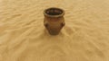 Greek ceramic amphora on sand, close up