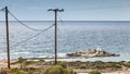 Greek coastline, Agios Fokas chapel and power line