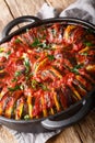 Greek cuisine Briam vegetable mix close-up in a pan. vertical Royalty Free Stock Photo