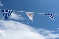 Greek and Cypriot national flags in fronf of sky