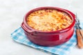 Greek dish moussaka made in traditional ceramic pot, horizontal, copy space Royalty Free Stock Photo