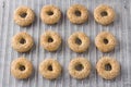 Greek Easter cookies with sesame seeds koulourakya or koulouria on a wire rack. Step by step instruction. Do it yourself