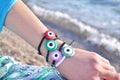 Greek evil eye bracelets advertisement on beach