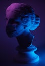 Dark and conceptual image of a female bust in greek style with mask Royalty Free Stock Photo