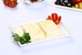 Greek feta cheese block on white. Royalty Free Stock Photo