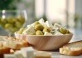 Greek feta cheese with green olives and rosemary on table with bread.Macro.AI Generative