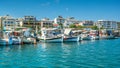 Greek fishing boats in port of Rethymno, Crete island, Greece. View of the port of Rethymno from the sea side with boats and Royalty Free Stock Photo