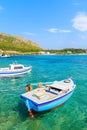 Greek fishing boats on turquoise sea water in Posidonio bay, Samos island, Greece Royalty Free Stock Photo