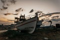 Greek fishing harbor scene with boats, at sunrise on a beautiful tranquil summer day in july Royalty Free Stock Photo