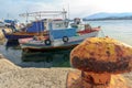 Greek fishing moored motor boats floating near concrete Mastihari bay on Greek Kos island Royalty Free Stock Photo