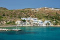 Greek fishing village with traditional whitewashed white houses on Milos island