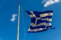 Greek flag against blue sky Royalty Free Stock Photo