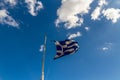 Greek flag against blue sky Royalty Free Stock Photo