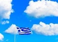 Greek flag against Greek sky Royalty Free Stock Photo