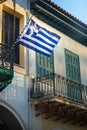 Greek flag on the balcony