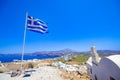 Greek flag on a blue sky at Santorini island Royalty Free Stock Photo