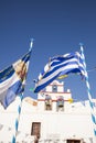 Greek flag with church bells in the background