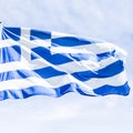 Greek flag and cloudy sky in summer day, politics of Europe