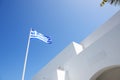 The Greek flag and hotel building, Santorini island Royalty Free Stock Photo