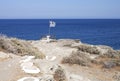 Greek flag on seashore Royalty Free Stock Photo