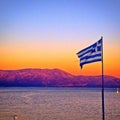 Greek flag at sunset Royalty Free Stock Photo