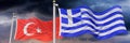 Greek flag and Turkey flag flutter in stormy weather