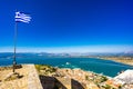 Greek Flag waving on Palamidi Fortress in Nafplion, Argolis - Greece Royalty Free Stock Photo