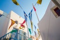 Street with colorful flags in Mykonos, Greece Royalty Free Stock Photo