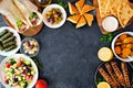 Greek food frame, top view on a dark background Royalty Free Stock Photo