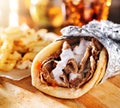 Greek gyro with fries close up